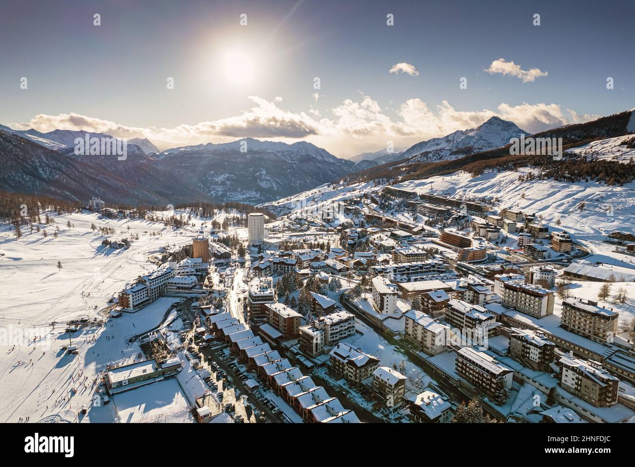 Aerial view of Sestriere village from above, famous ski resort in the italian western Alps, Piedmont, Italy. Sestriere, Italy - February, 2022 Stock Photo