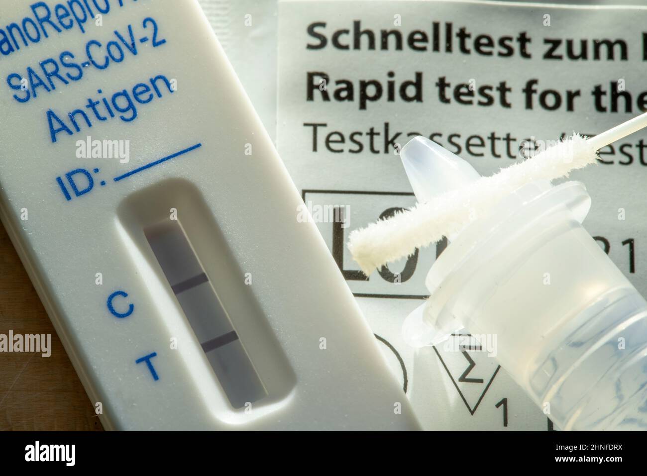 Positive Corona Antigen Rapid Test, lay test, self-test, for the detection of SARS-CoV-2 infection, test result positive, Stock Photo