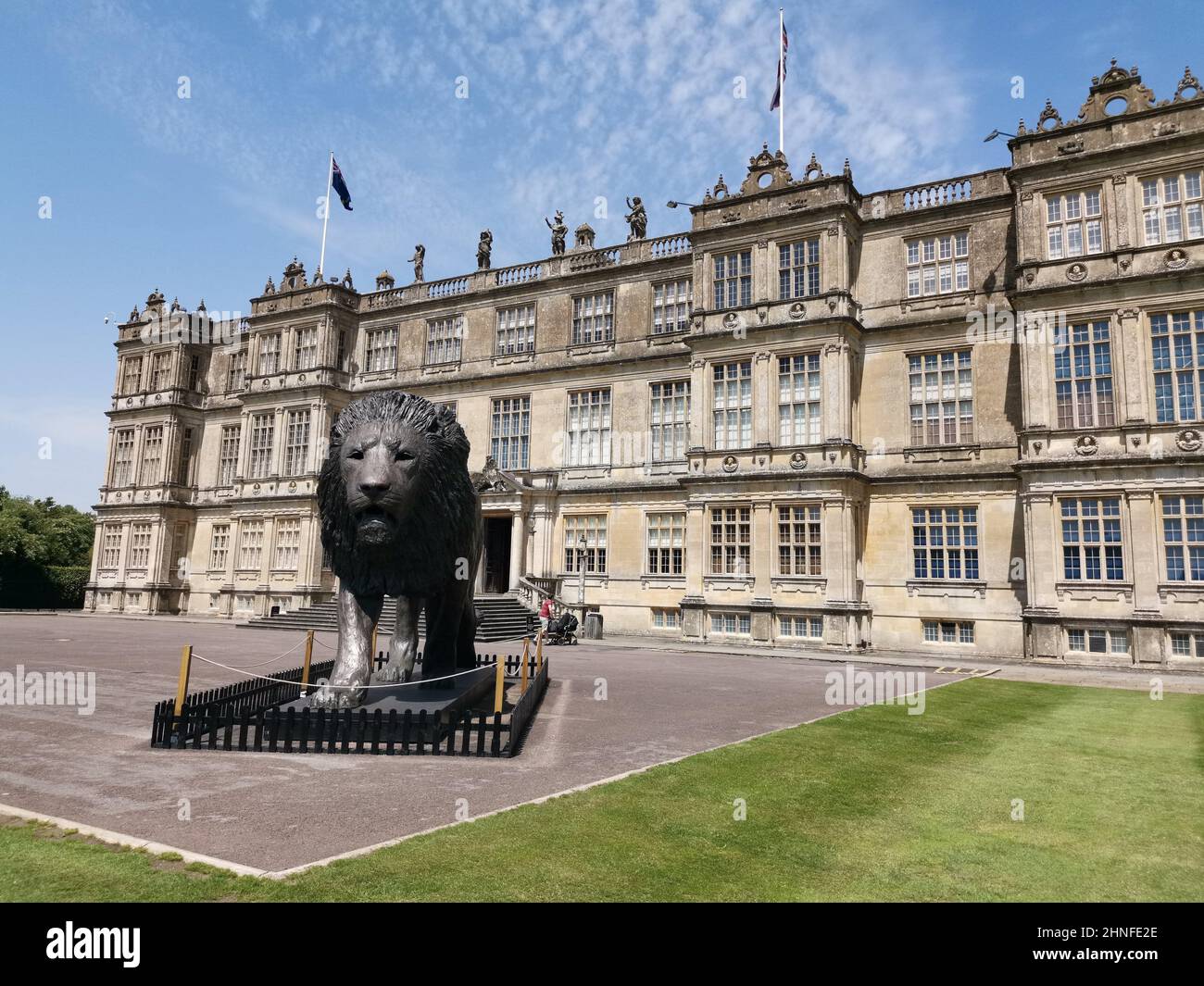 View of a lion statue in the Longleat an English stately home and the ...