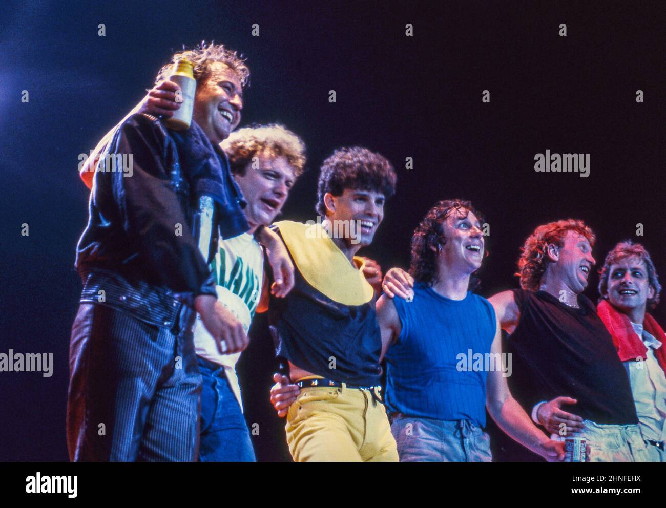 Mick Jones, Lou Gramm, Mark Rivera, Dennis Elliott, Rick Wills and Bob Mayo of Anglo-American band Foreigner taking a bow at the end of a concert at Wembley Arena, London, in 1982. Stock Photo