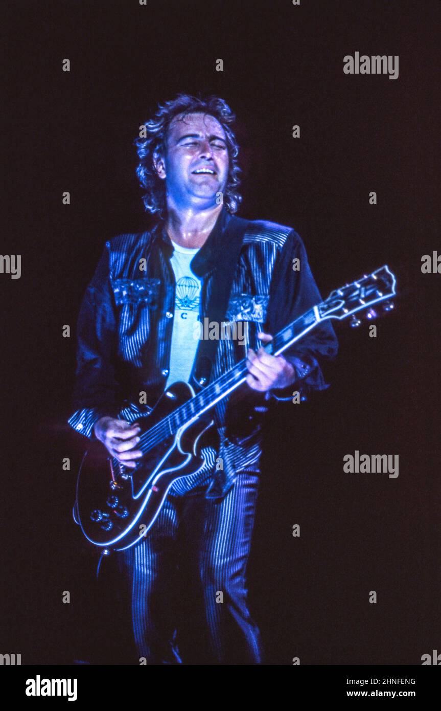 Guitarist Mick Jones performing with of Anglo-American band Foreigner at Wembley Arena, London in 1985. Stock Photo