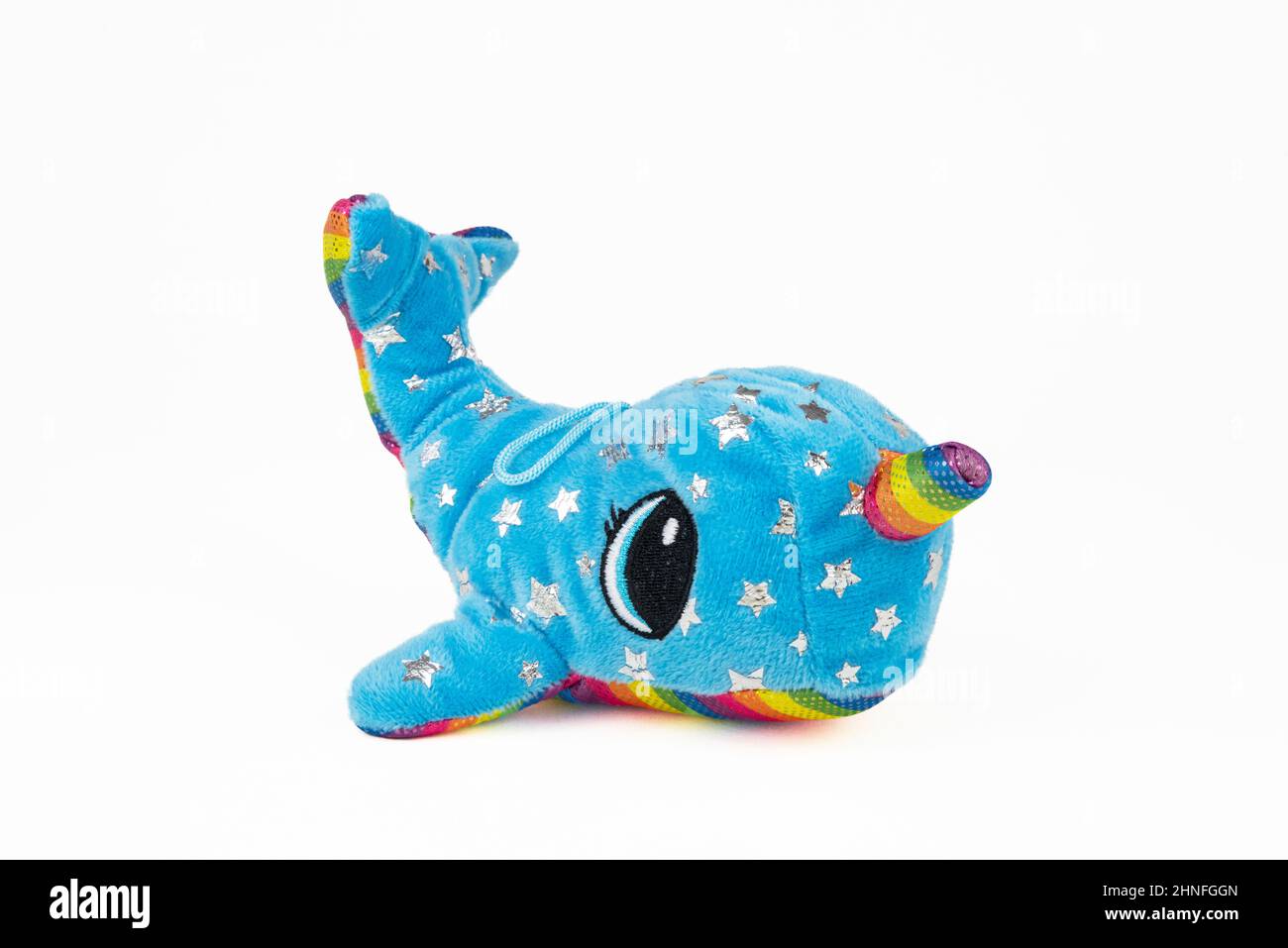 A blue whale plush with a unicorn horn Stock Photo Alamy