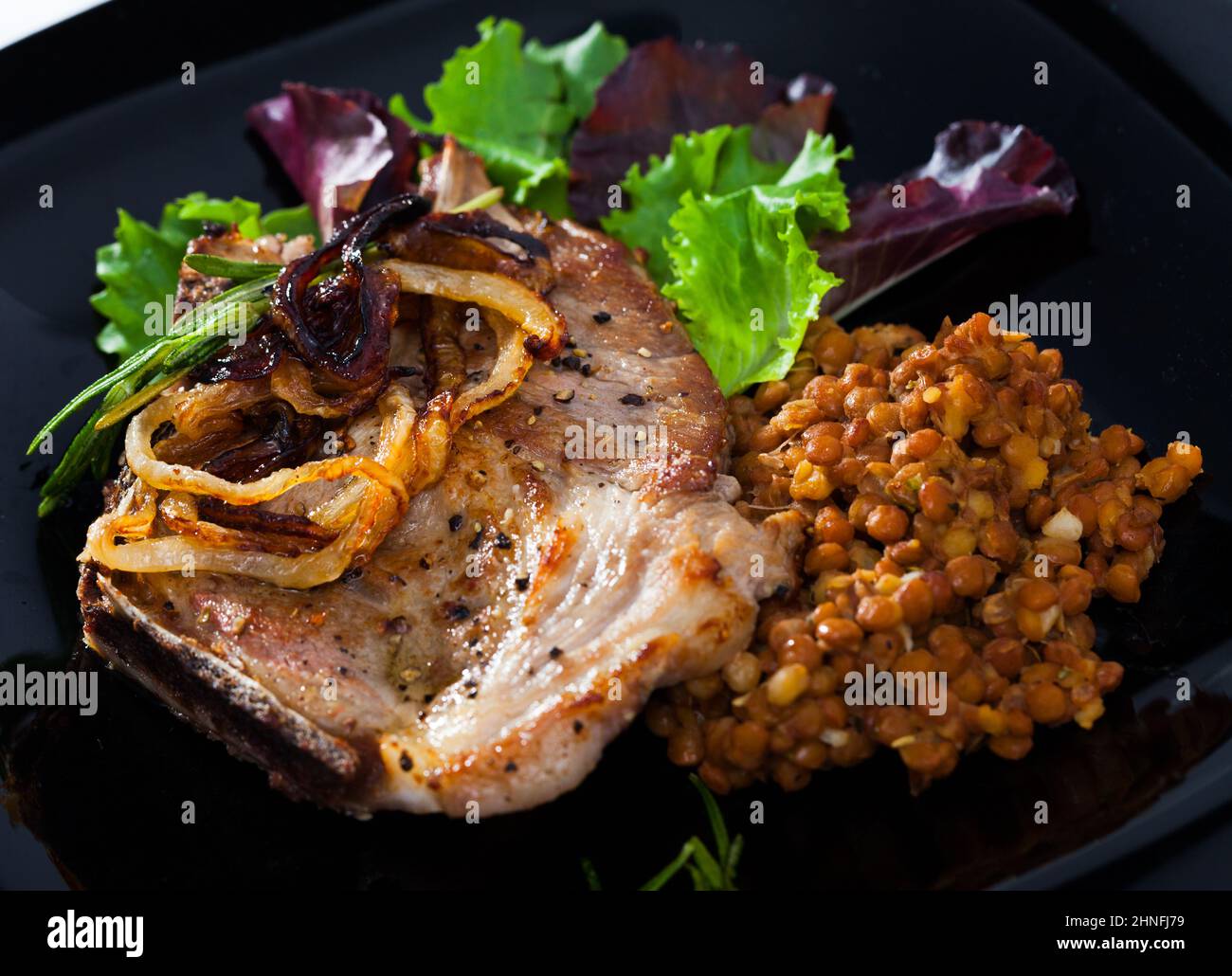 Close-up of roasted pork chop Stock Photo