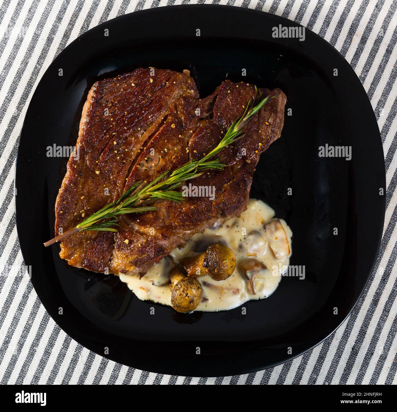 Image of beef entrecote with mushroom sauce Stock Photo Alamy