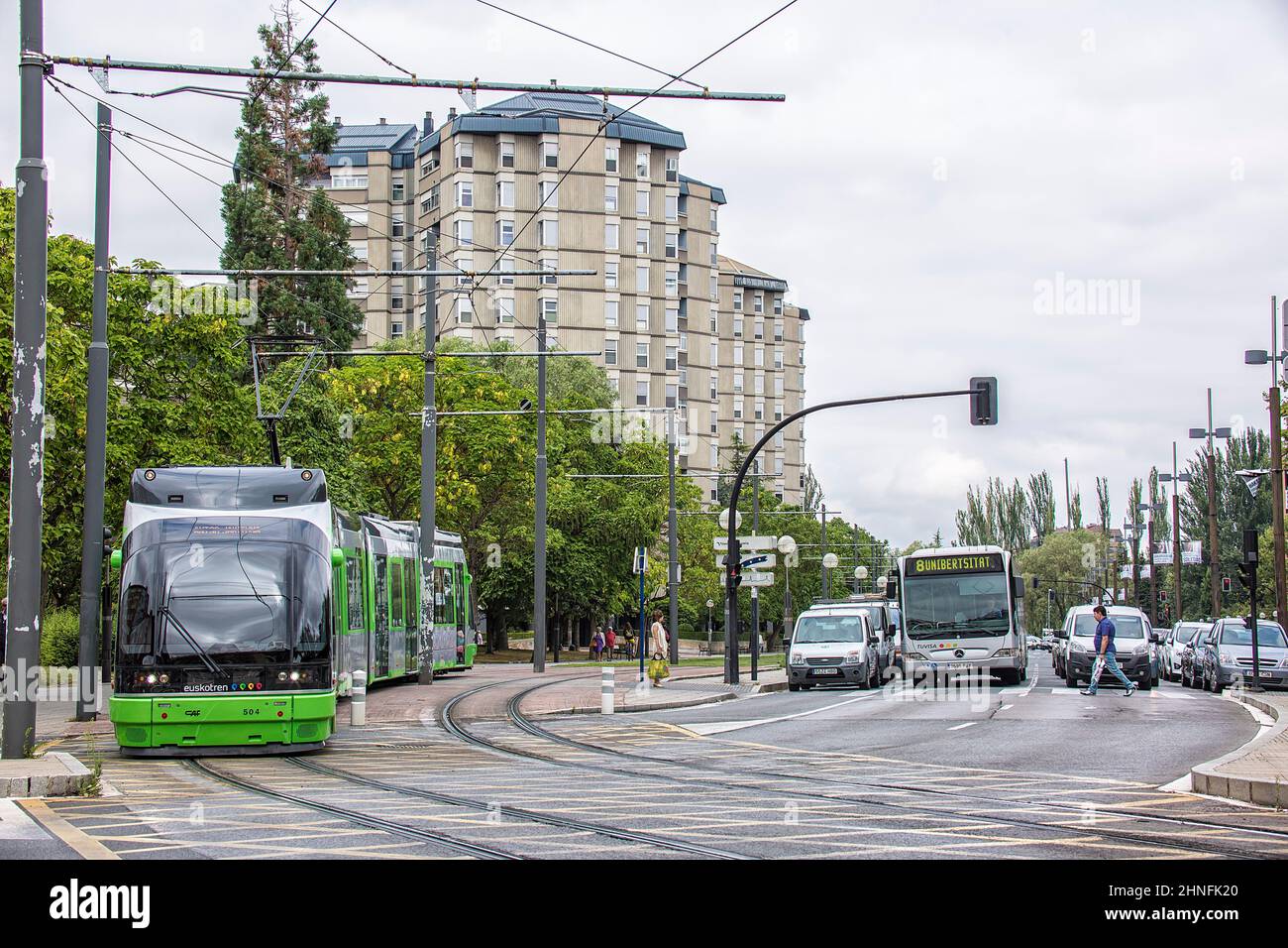 Mobility in the city of Vitoria, tram and people moving around the city at the same time. Stock Photo