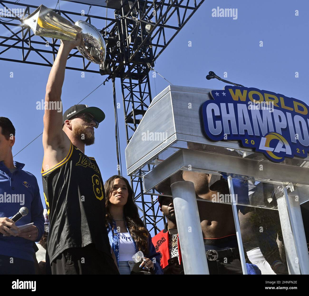 Los Angeles, United States. 16th Feb, 2022. Los Angeles Rams' wide receiver  Cooper Kupp holds up the Championship trophy as he celebrates their Super  Bowl LVI victory with teammates during a parade