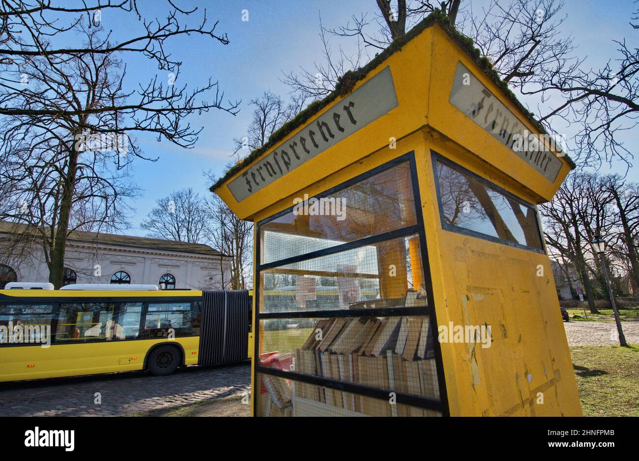 Old telephone booth where books are offered for exchange, Luebars, Reinickendorf district, Berlin, Germany Stock Photo