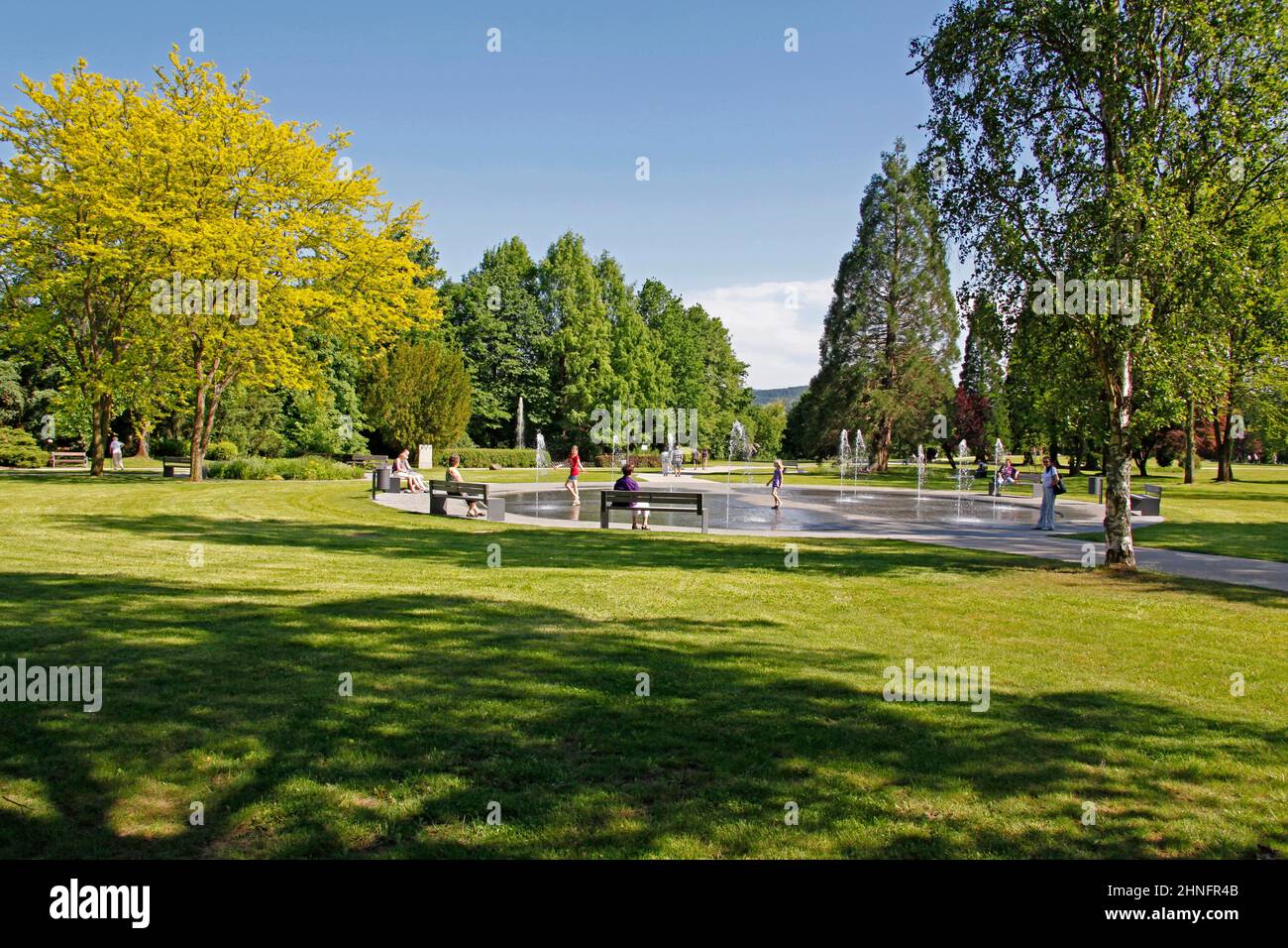 Spa park, fountain, spa guests, Bad Soden-Salmuenster, Hesse, Germany Stock Photo