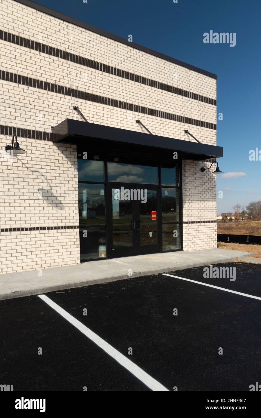 Vertical shot of a new retail storefront under construction Stock Photo