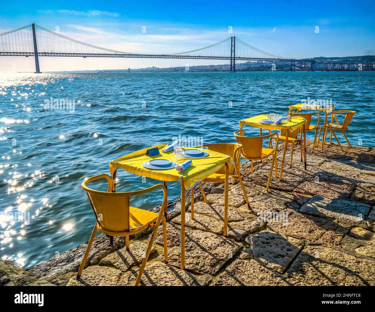 Lisbon, Portugal - Famous bridge Ponte 25 de Abril in the background. It spans 2277,64 m across river Targus. Stock Photo