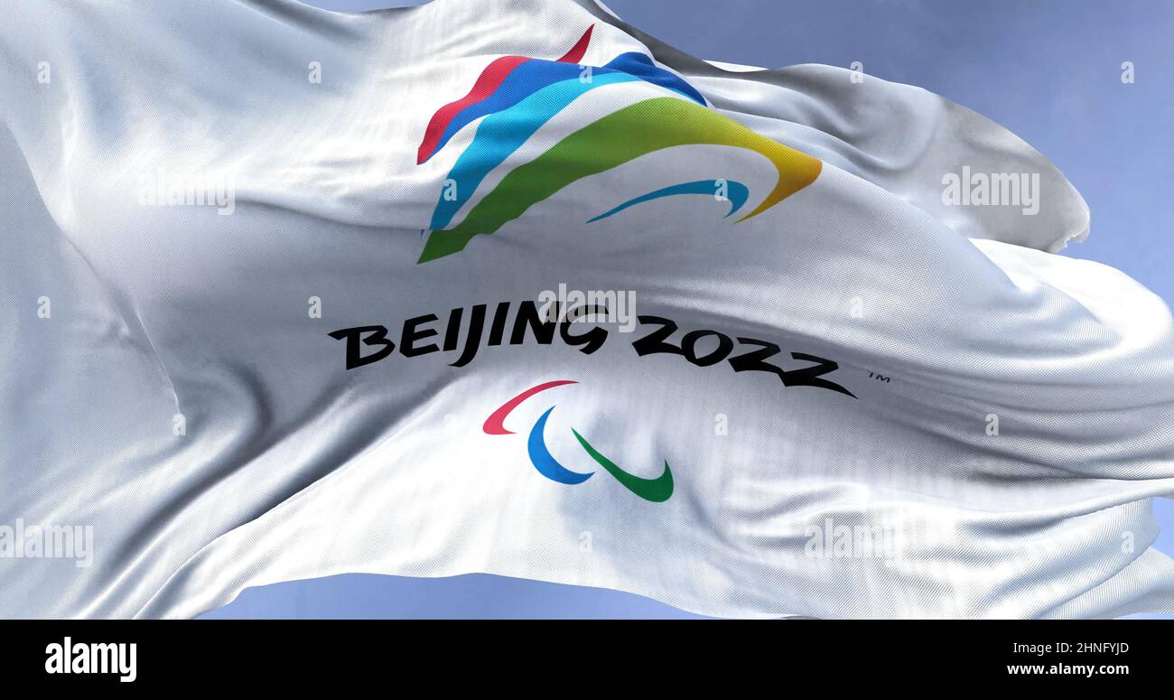 Beijing, CHN, Jan. 2022: Beijing 2022 winter paralympic games flag waving in the wind. Beijing 2022 winter paralympic games are scheduled to take plac Stock Photo