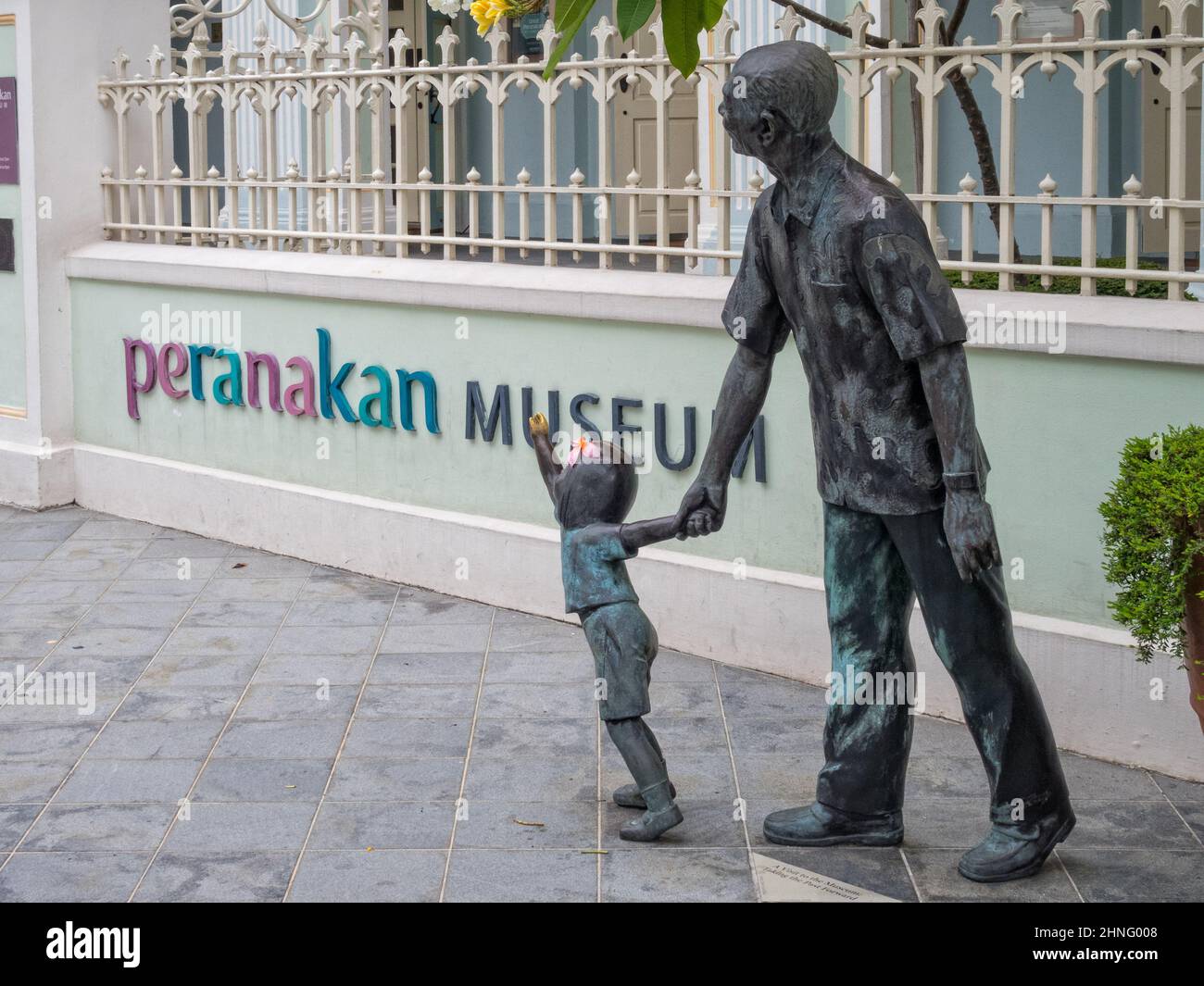 Bronze sculpture in front of the Peranakan Museum Singapore Stock