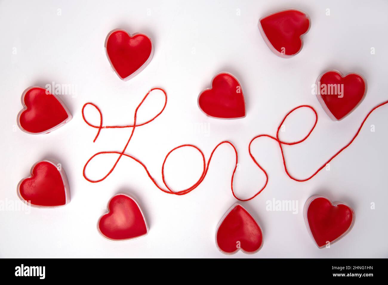 The word love and red hearts around the word. Romance. february 14 valentine's day Stock Photo