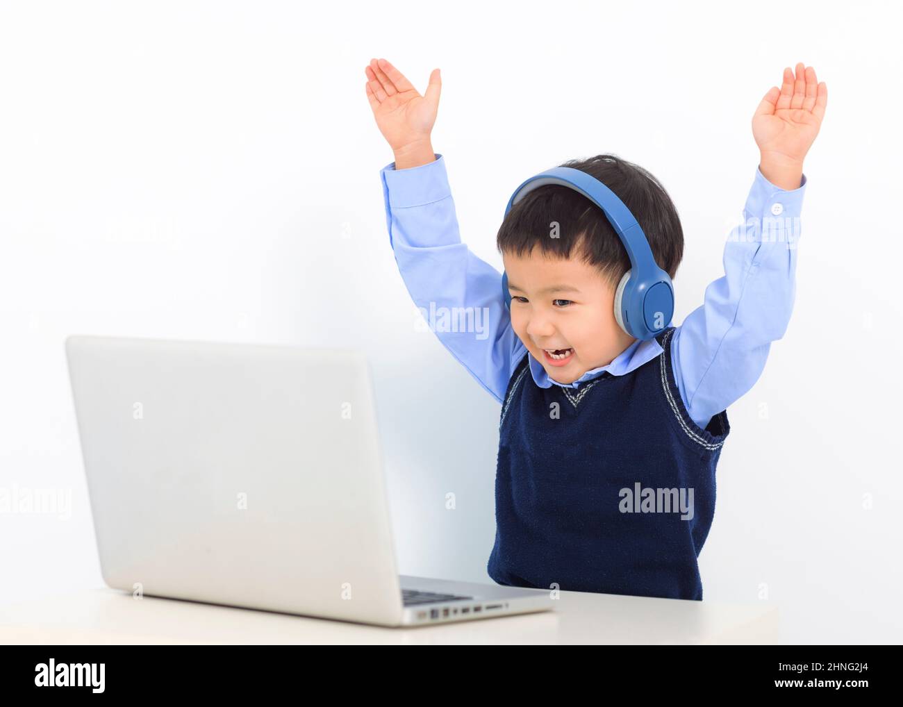 Happy little boy study online with video call teacher at home Stock ...