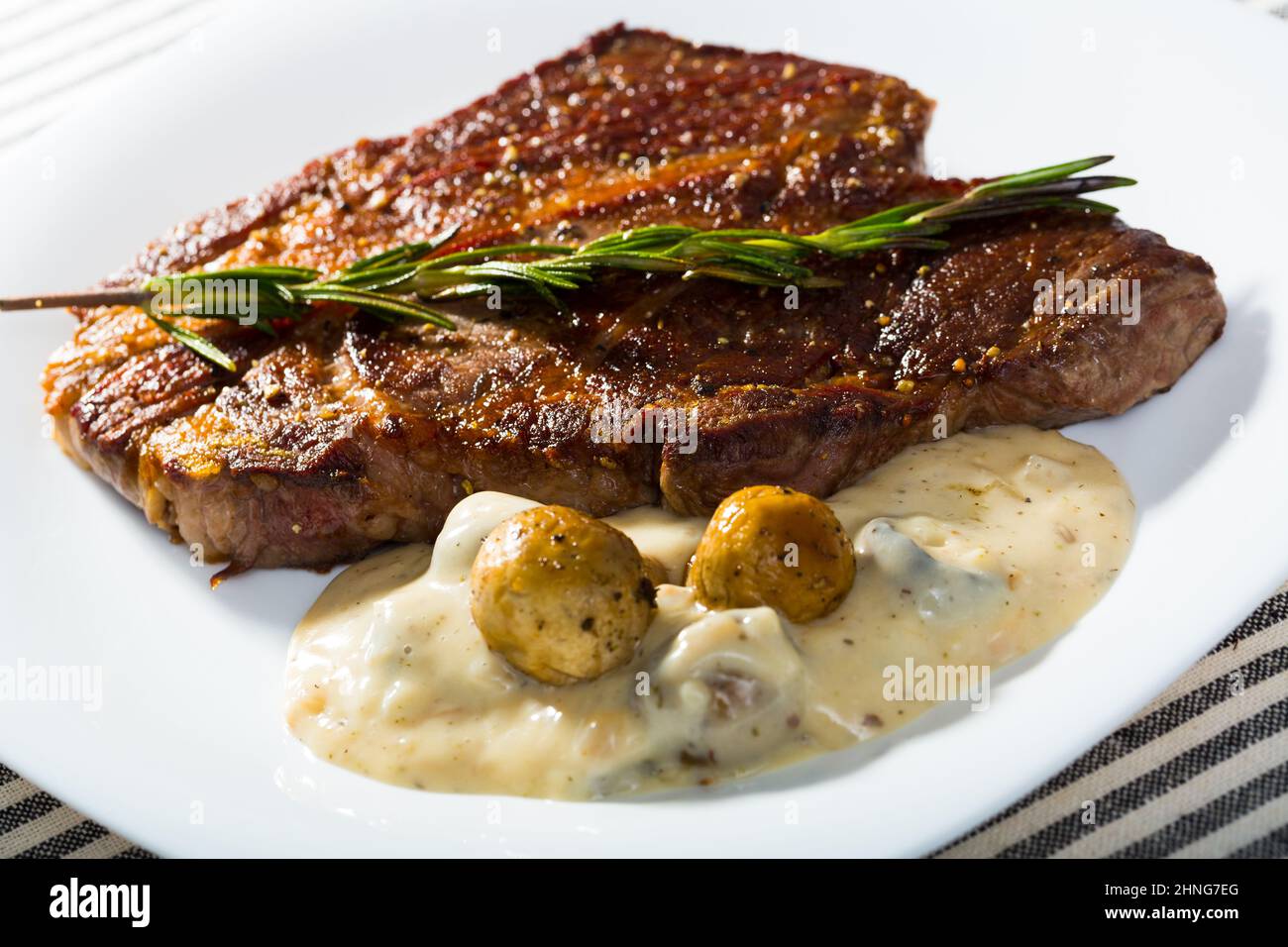 Roasted veal steak with mushroom sauce Stock Photo Alamy