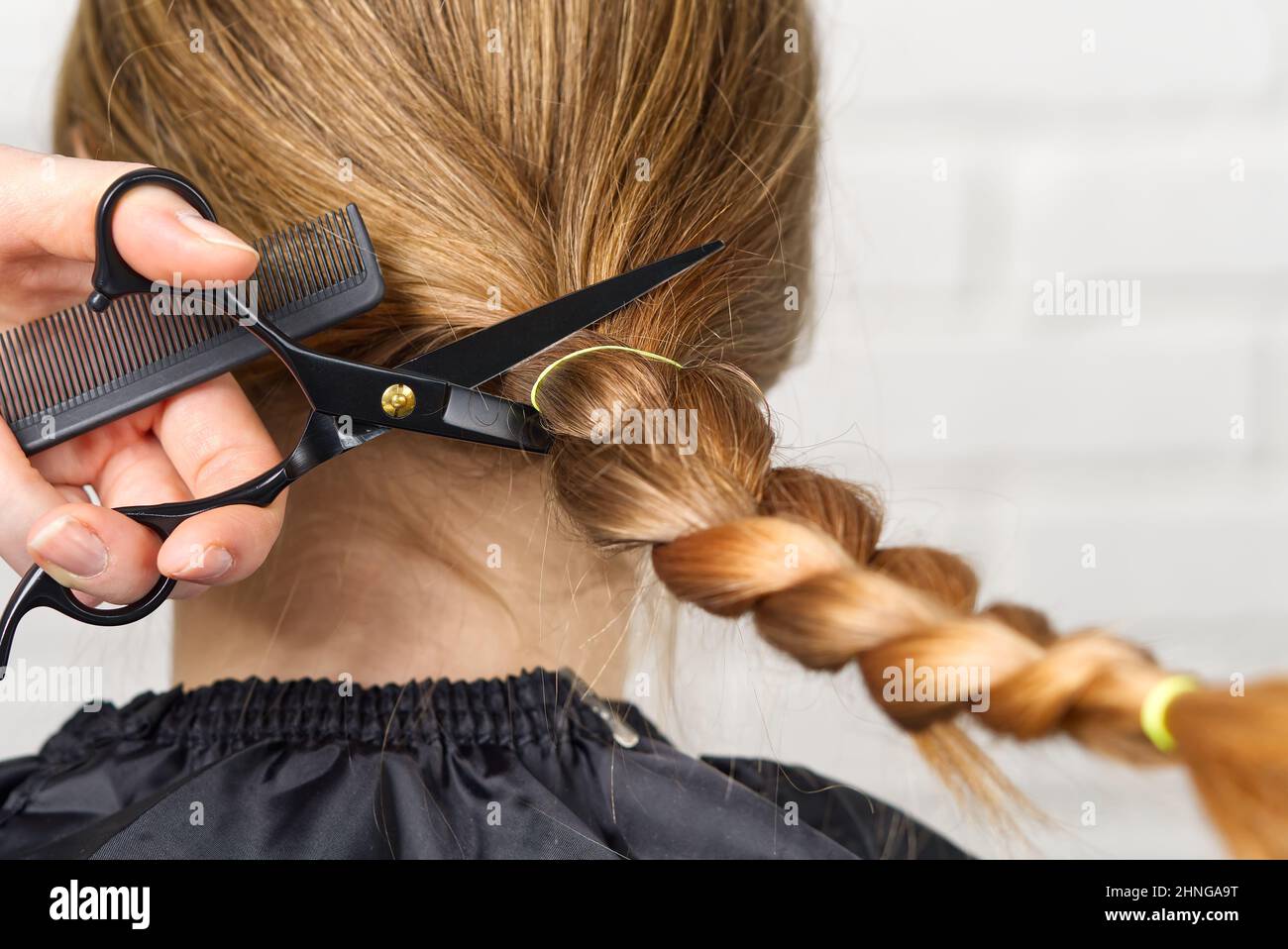 woman hair donations for people with cancer. Concept of hair donation
