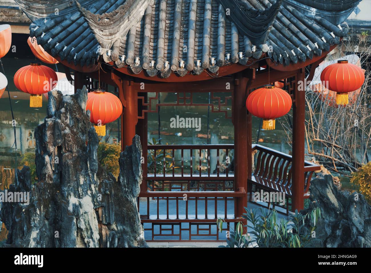 Red Chinese lanterns hanging on a Chinese pavilion Stock Photo