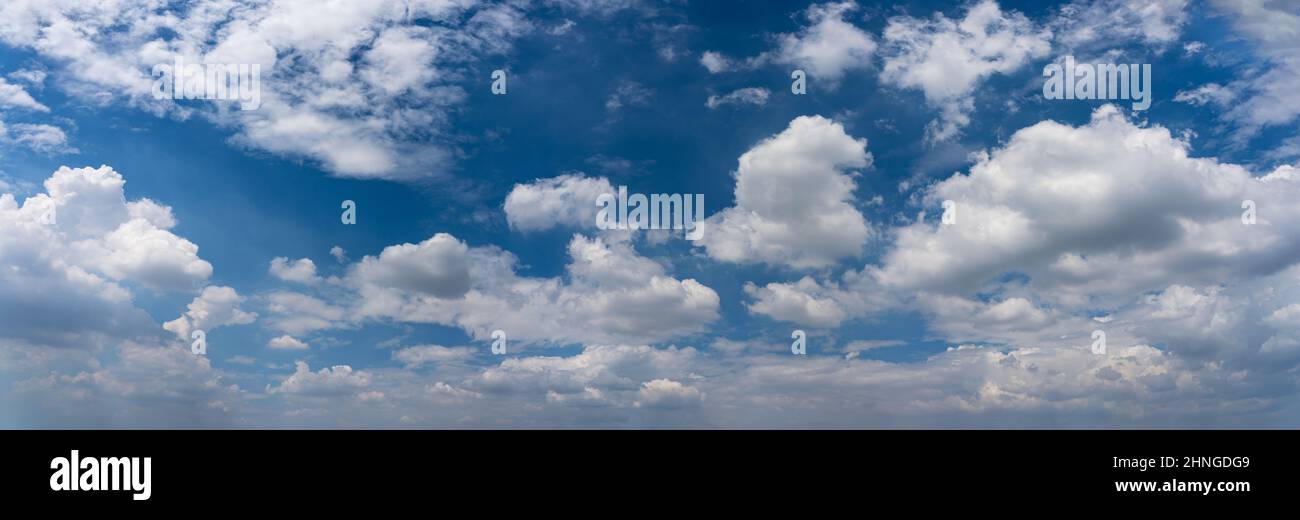 Panorama photo of white clouds in the blue sky background Stock Photo ...