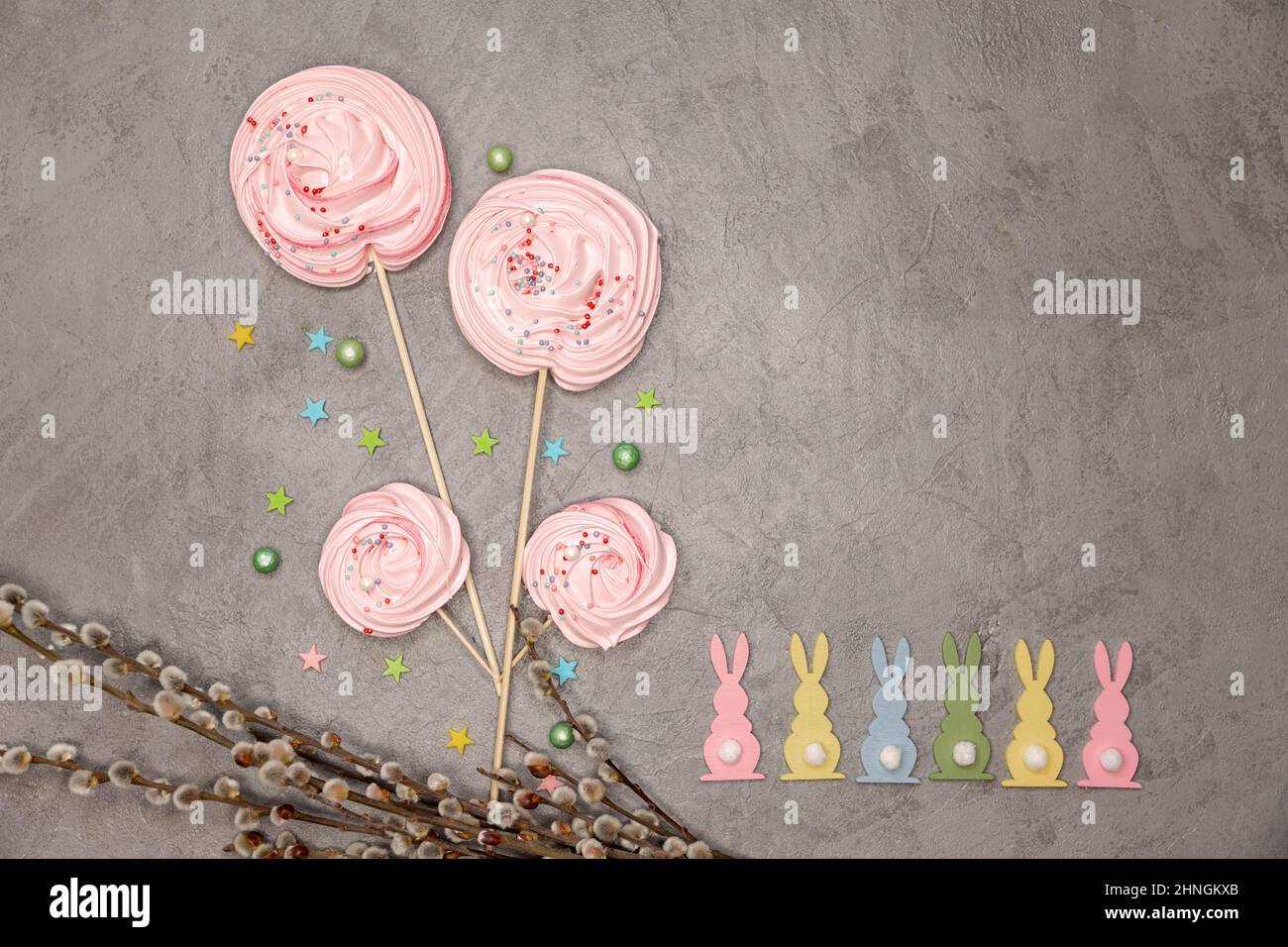 Whipped egg cream cookies . Easter composition with rabbits Stock Photo