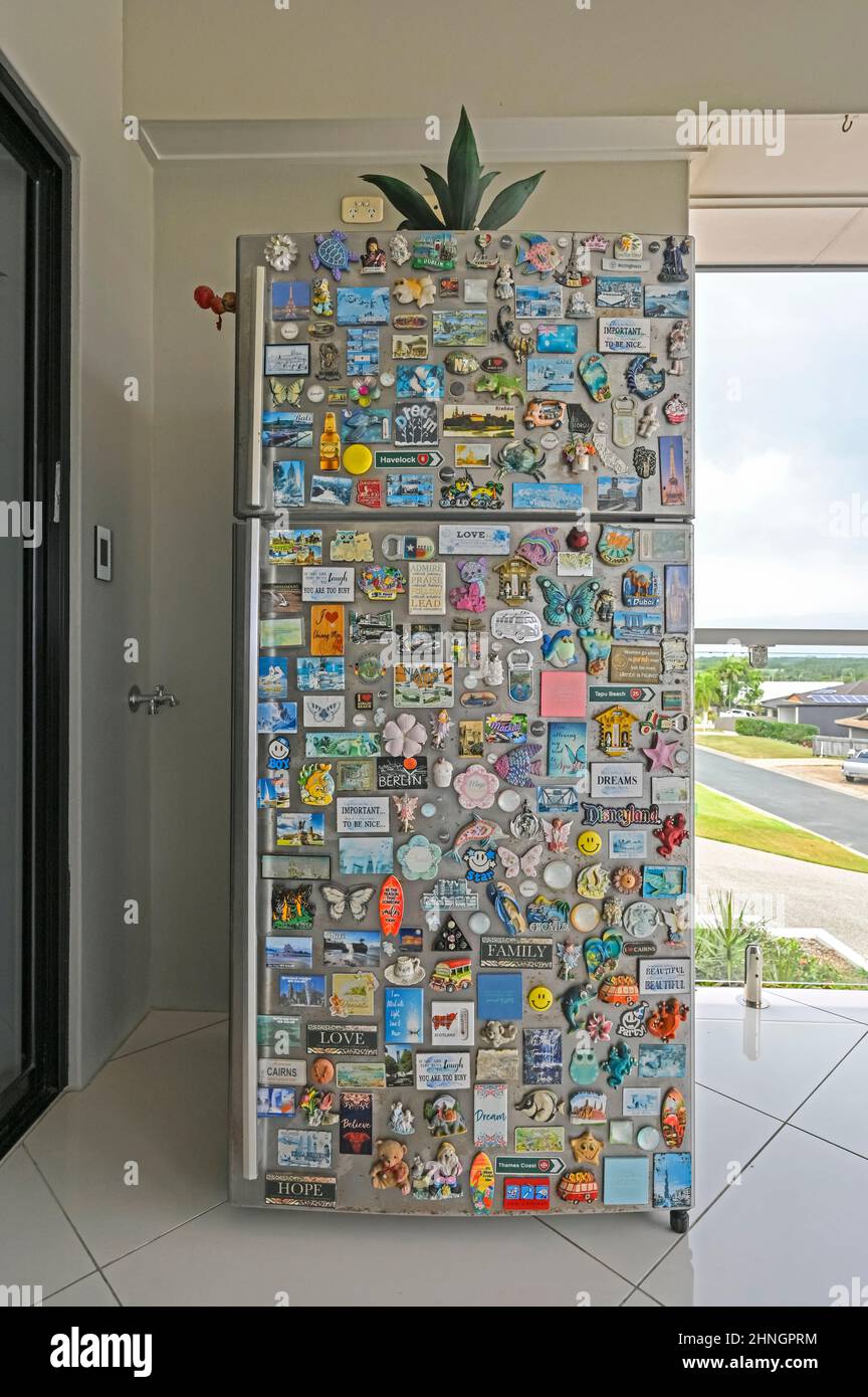 Fridge covered in fridge from travelling around the world Stock