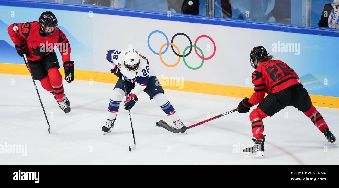 USA defenseman Anne Schleper (15) cross checks Canada forward Jayna Hefford  (16) in the second period of the women's hockey gold medal game at the  Bolshoy Ice Dome during the Winter Olympics