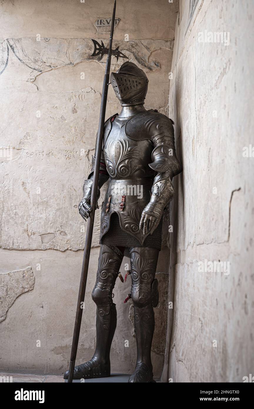 Ancient medieval armor with a spear in a castle Stock Photo