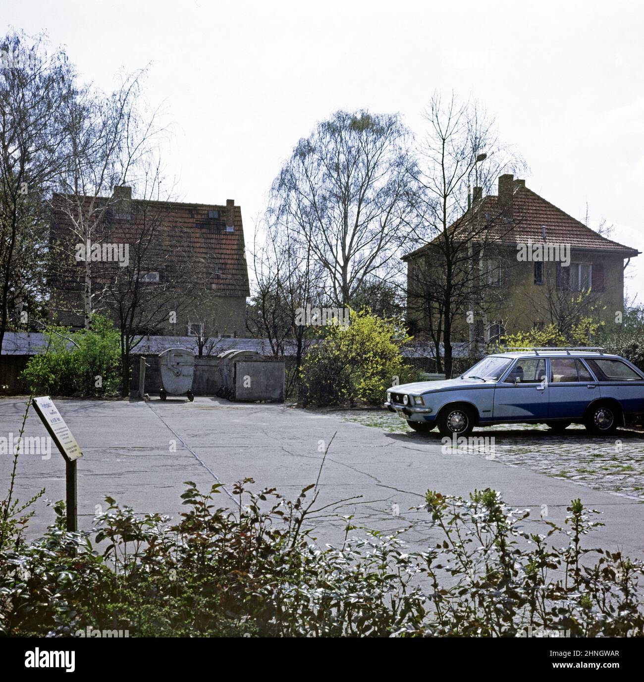 Border between Berlin-Zehlendorf and GDR, late 1970s, Neuruppiner Straße, the carpark is located in West Berlin, the houses in GDR, Berlin, Germany Stock Photo