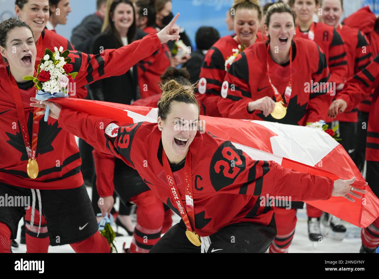 Canada's goalie Shannon Szabados and Marie-Philip Poulin celebrate