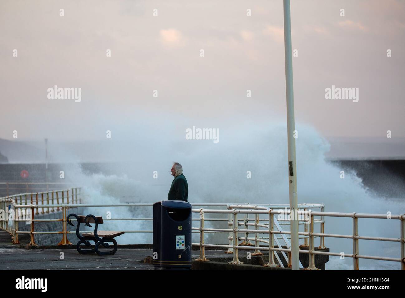 Aberystwyth, Ceredigion, Wales, UK. 17th February 2022 UK Weather: Strong winds continue along the west coast of Aberystwyth as stormy seas crash against the promenade. With further stormy weather expected tomorrow from storm Eunice. © Ian Jones/Alamy Live News Stock Photo