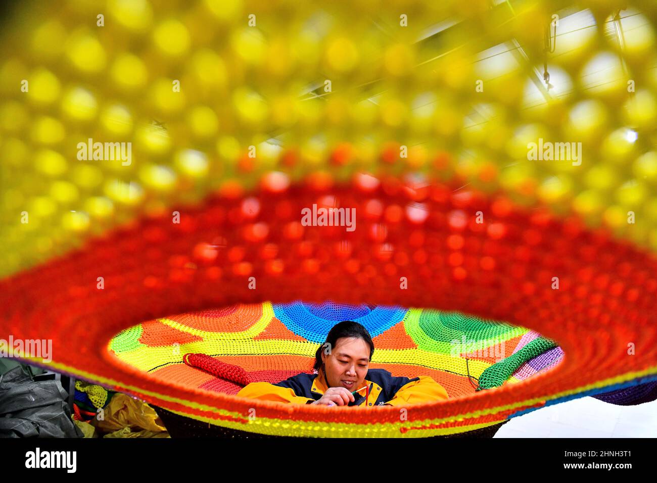 Beijing, China's Shandong Province. 11th Mar, 2021. An employee works at a rope net company in Lizhuang Township of Huimin County, east China's Shandong Province, March 11, 2021. Credit: Guo Xulei/Xinhua/Alamy Live News Stock Photo