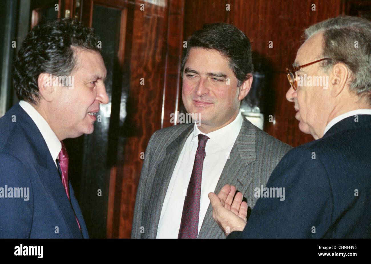 Bucharest, Romania, 1990. Australian- American business magnate Rupert Murdoch (right) with Romanian author & director of the Romanian Television Aurel Dragoș Munteanu (left), soon after the fall of communism. Stock Photo