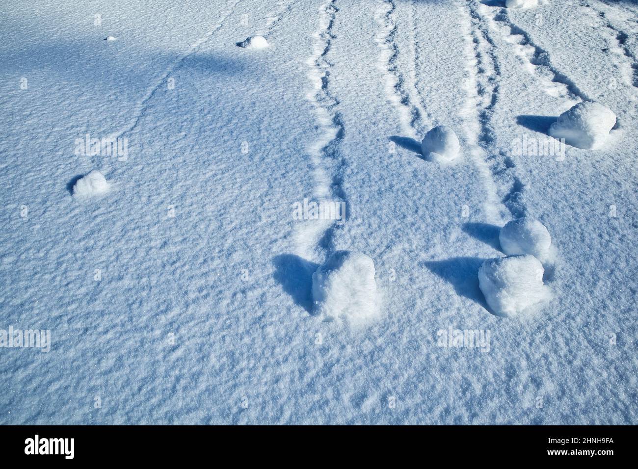 soft snow surface patterns in winter on hillside Stock Photo