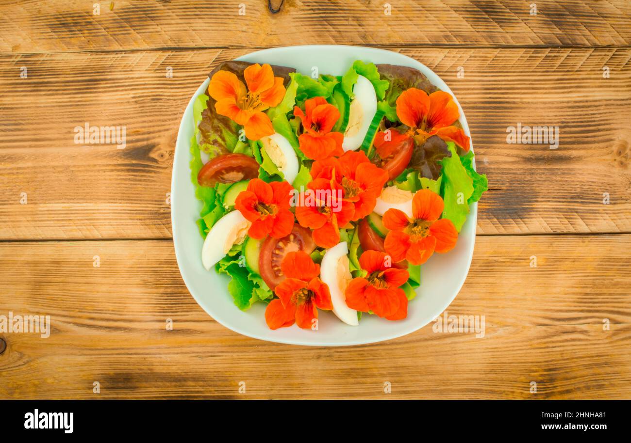 beautiful salad with edible flowers Stock Photo Alamy
