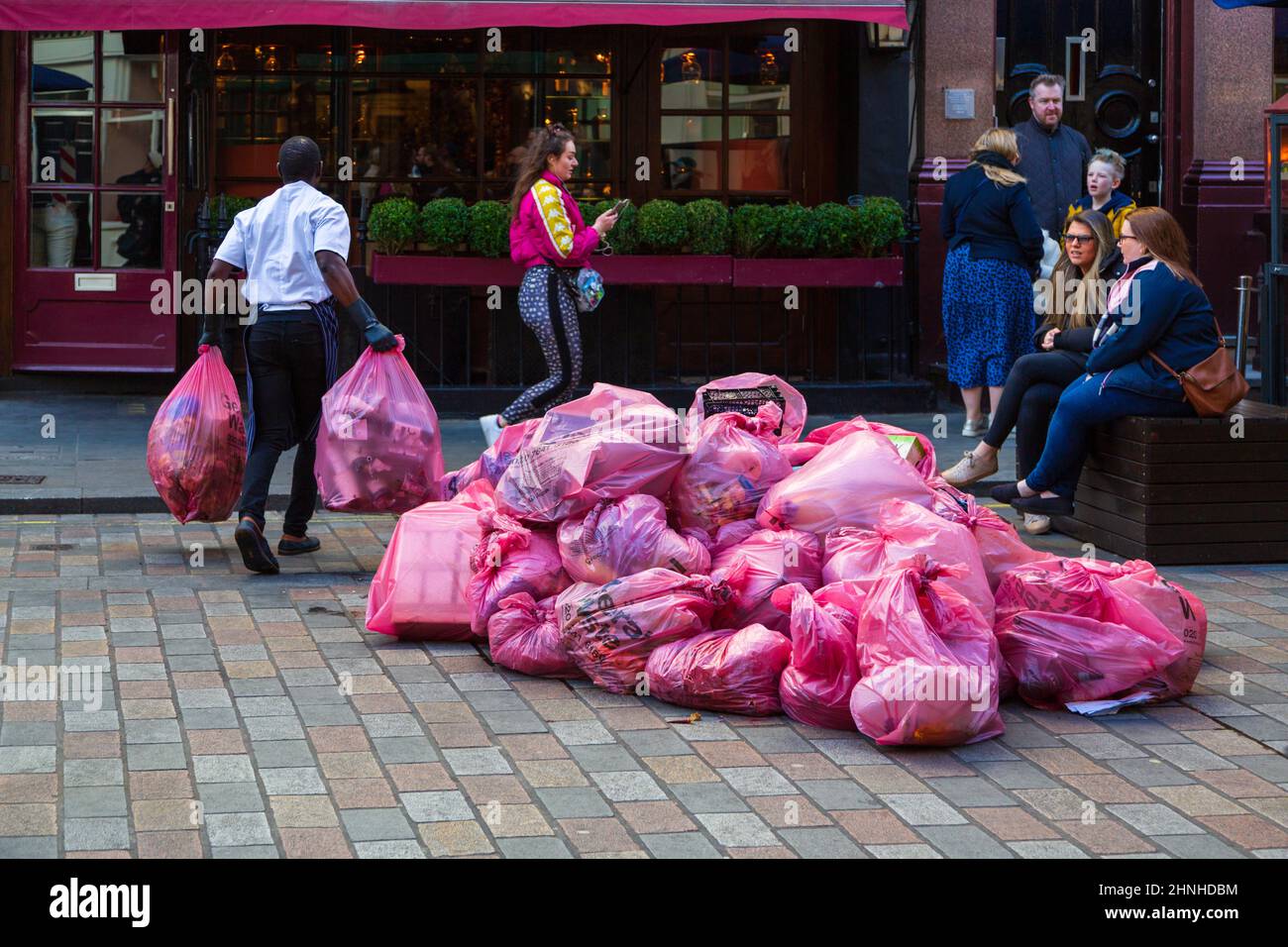 Bin bags left on the of a london street, uk Stock Photo