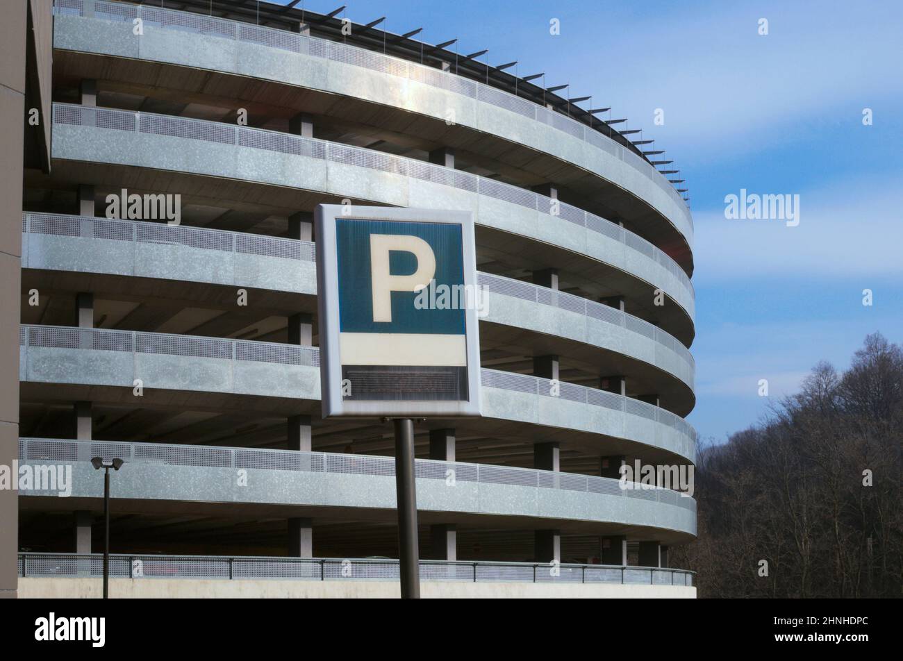Parking sign and Multi-level Parking Garage Stock Photo