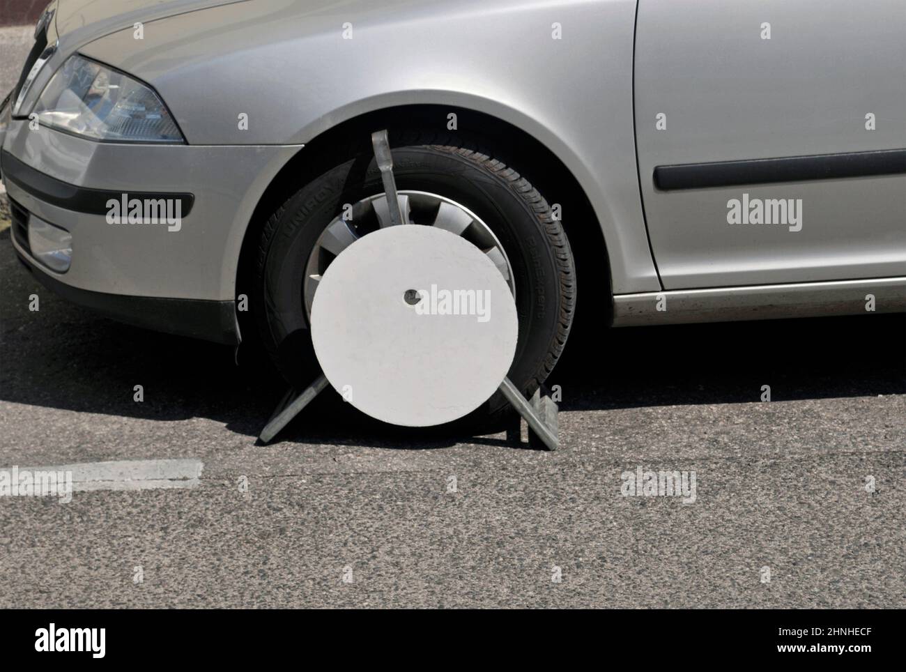 wheel clamp on car Stock Photo Alamy