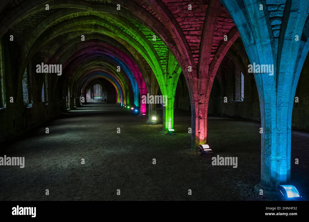 Floodlit cloisters at Fountains Abbey, Yorkshire, UK Stock Photo
