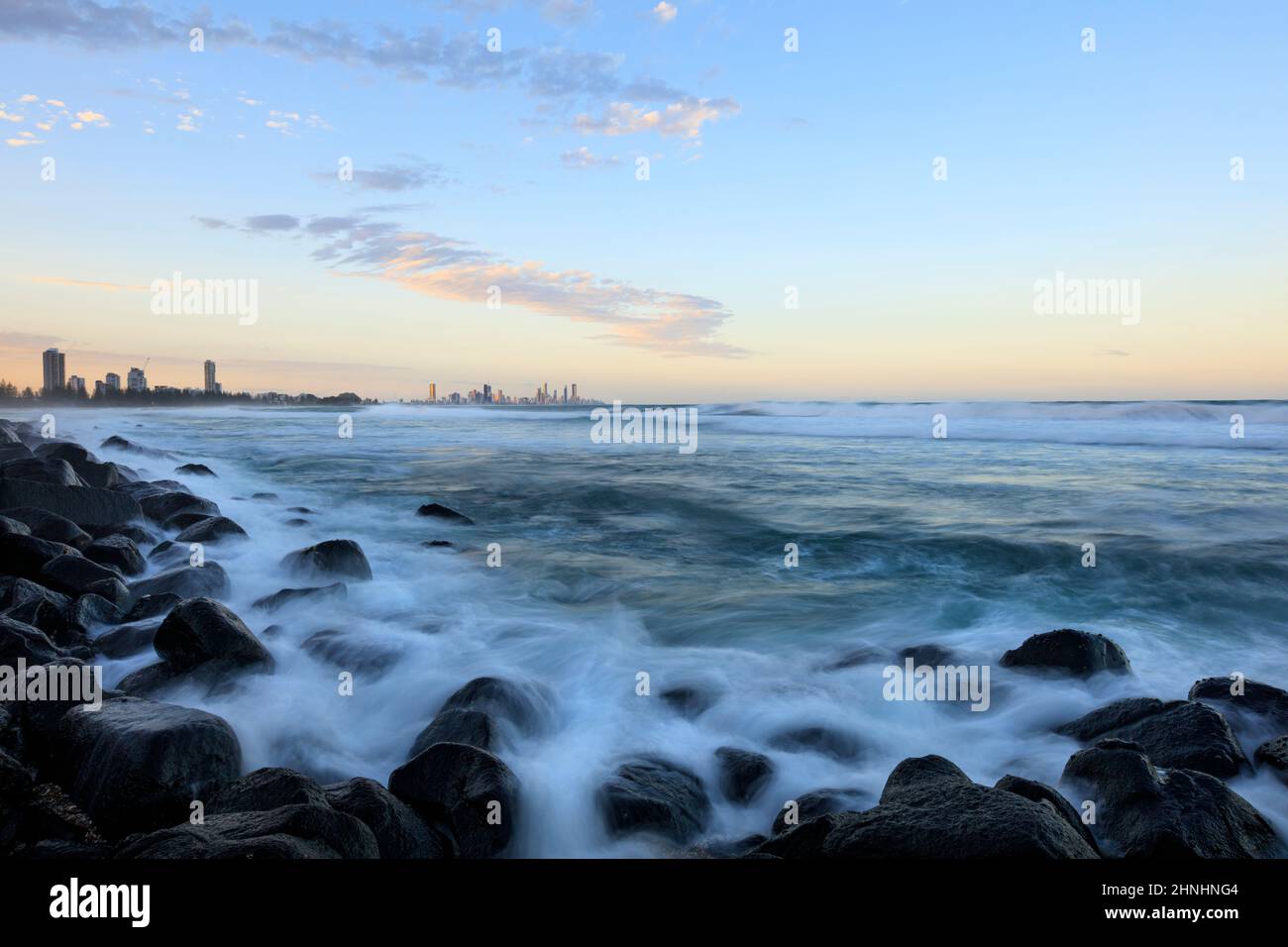 A view over the rocks of Burleigh Heads looking towards Surfers ...