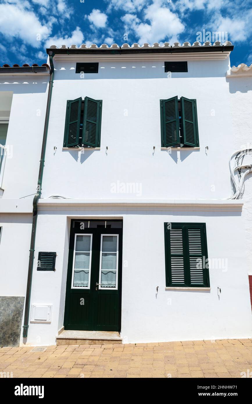 White house in the village of Fornells on summer in Menorca, Balearic island, Spain Stock Photo