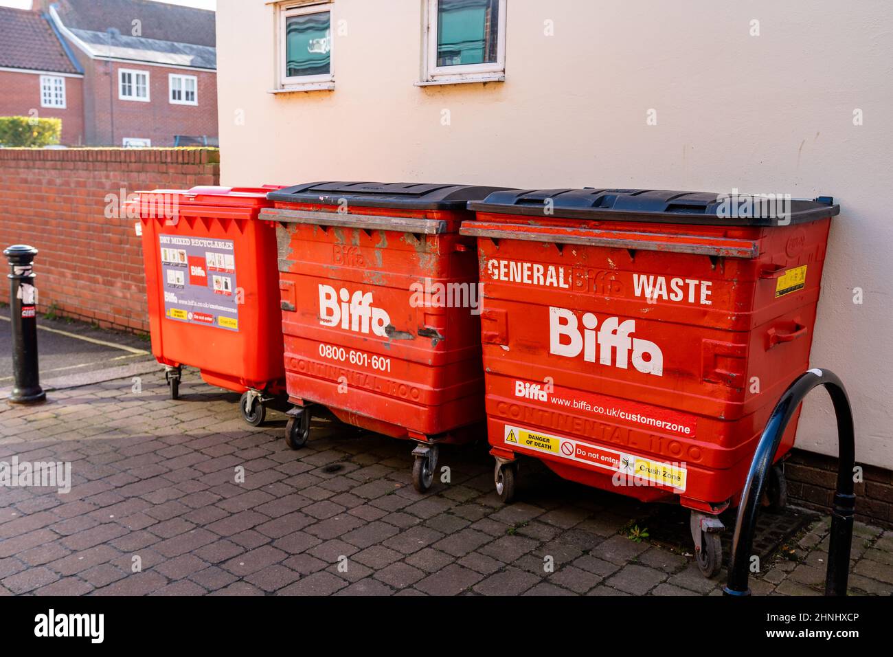 Woodbridge Suffolk UK February 16 2022 3 large red Biffa bins sitting