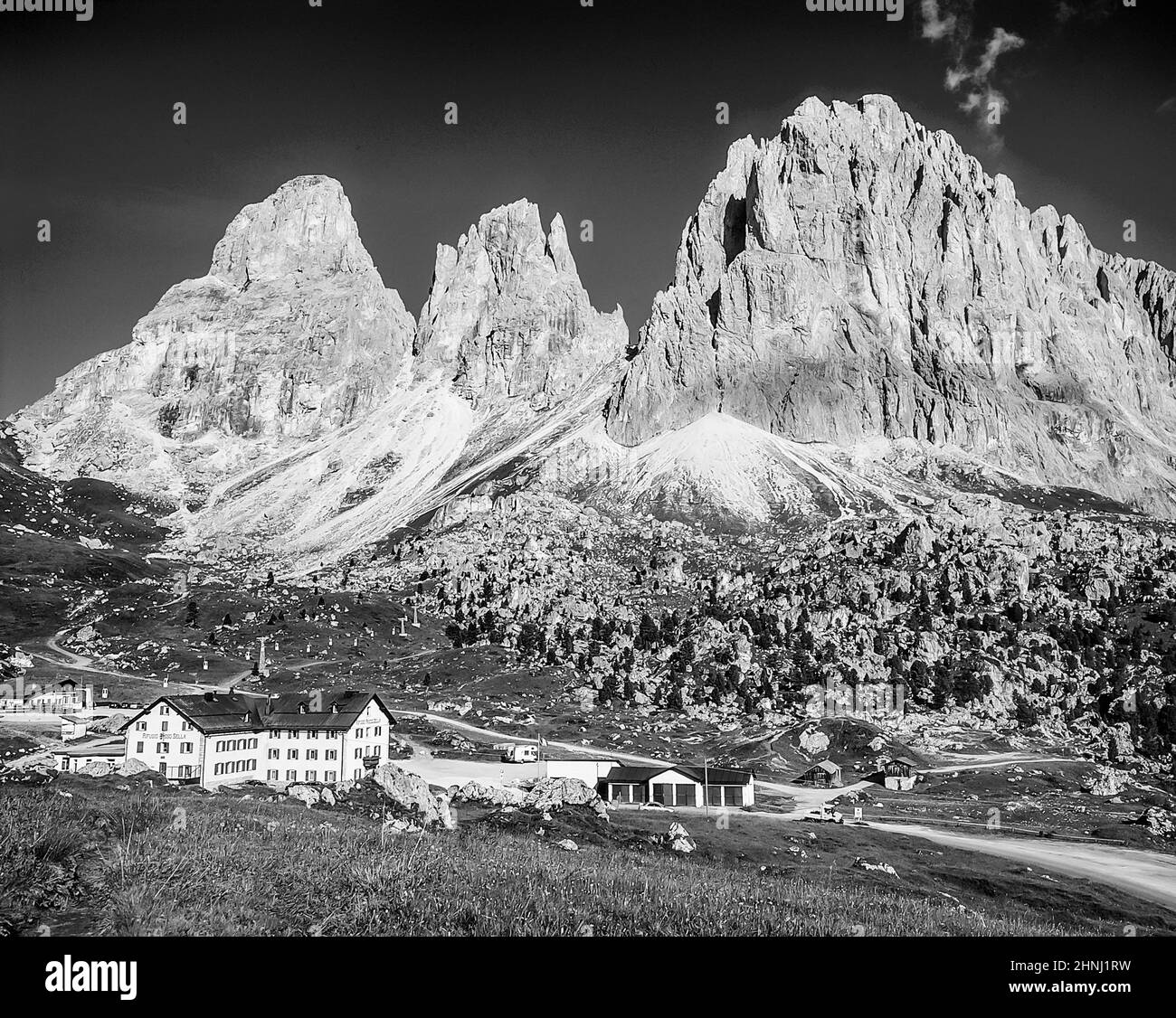 These are the dramatic three peaks of Langkofel from Sella Joch-Pass in the South Tirol of the Italian Dolomites in the Alto Adige, from left Grohmann Spitze, Funf Finger Spitze, Langkofel Stock Photo