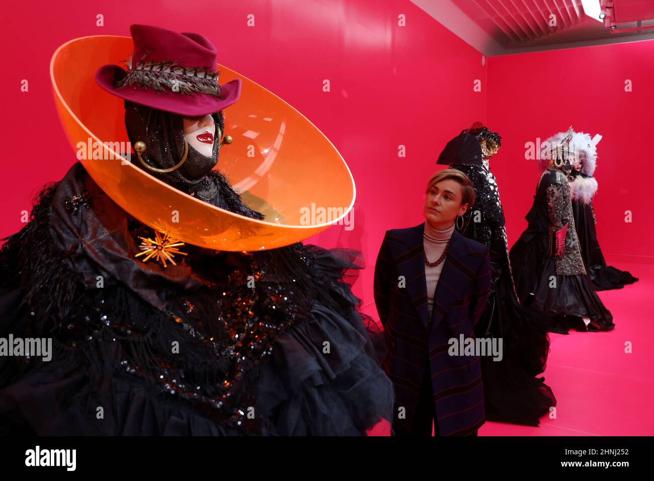 A Gallery Assistant Poses By A Sculpture By Daniel Lismore At The 