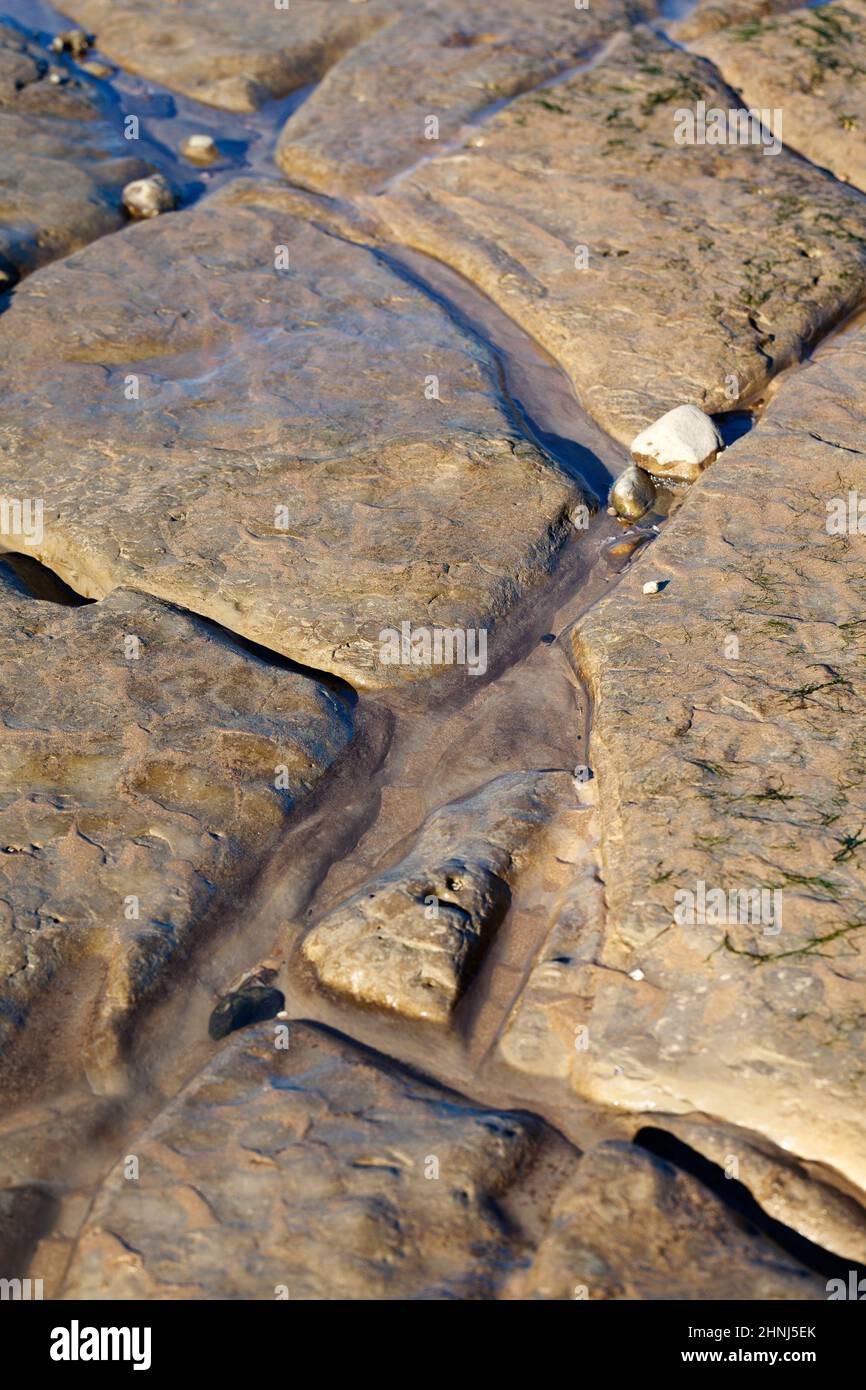 Background of Stone Surface texture on the Beach Stock Photo
