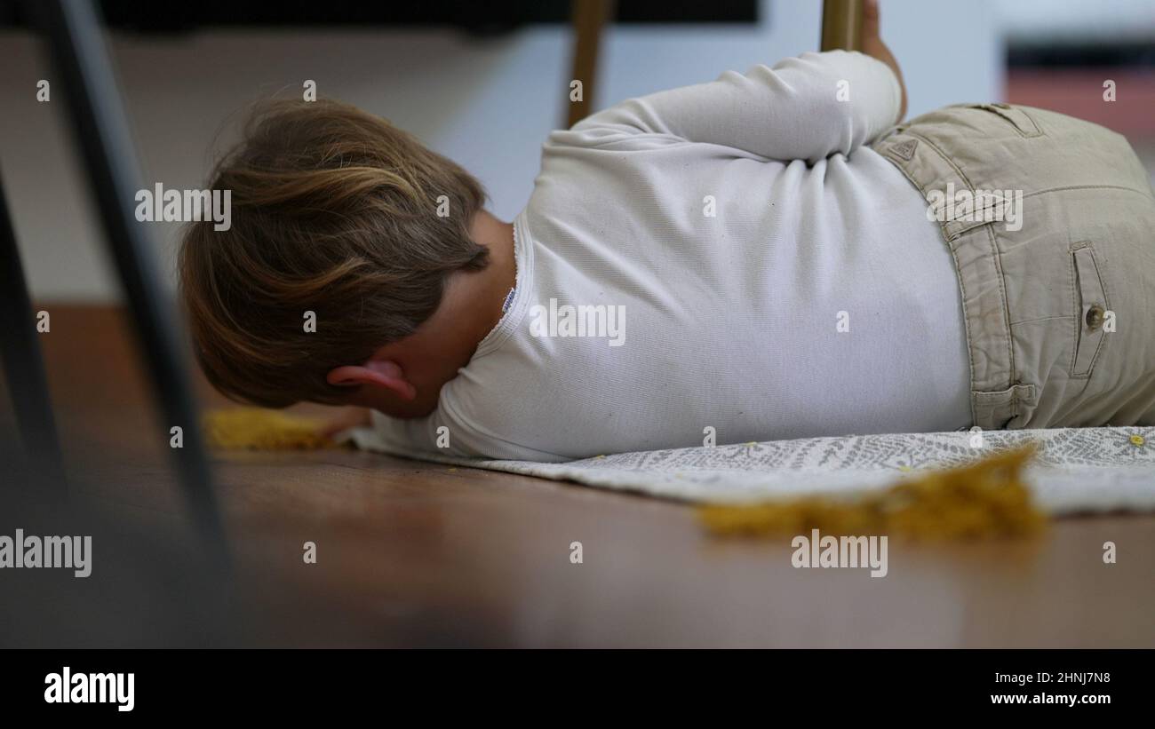 One little boy getting up from floor child gets up Stock Photo Alamy