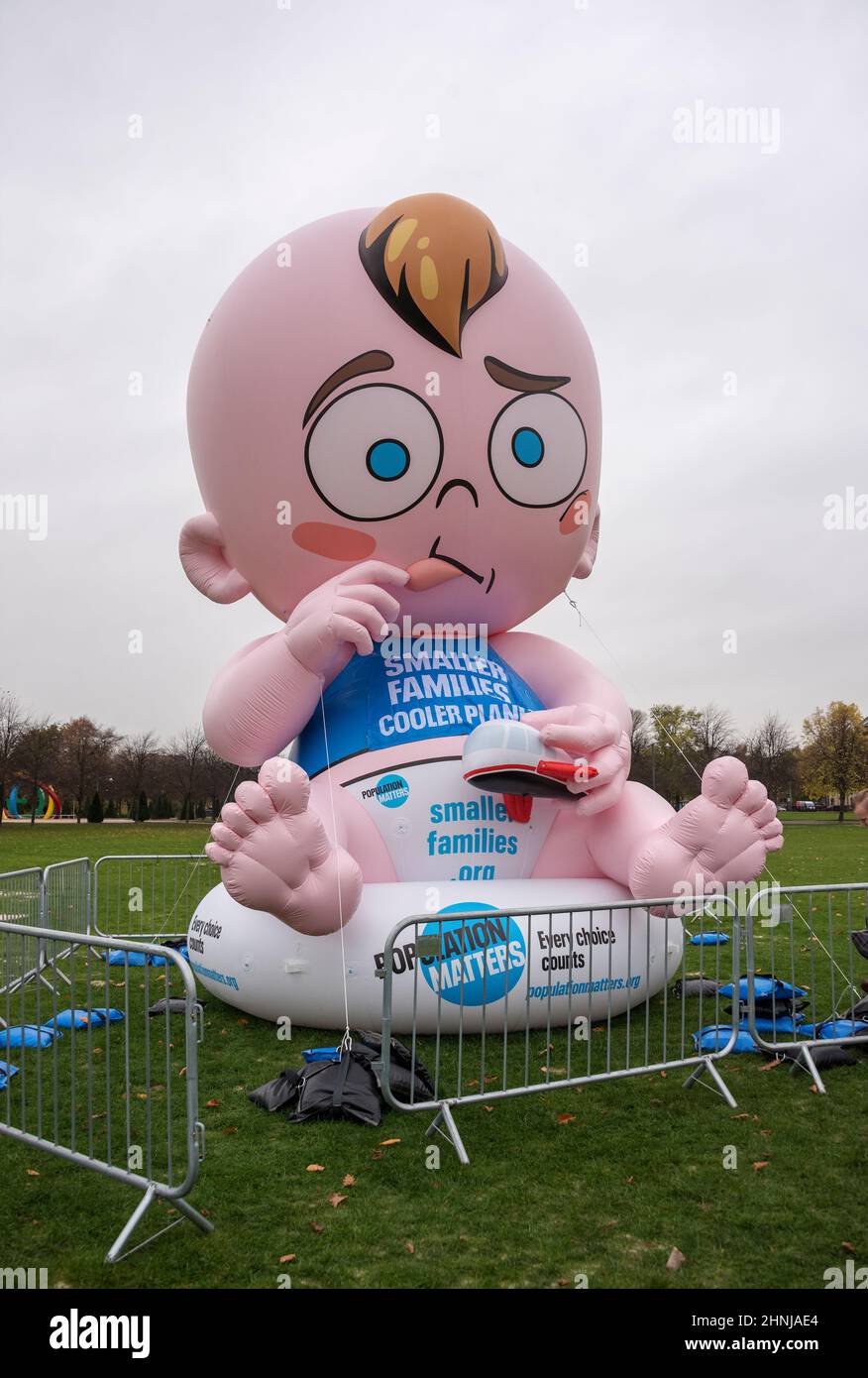 'Big Baby' inflatable baby by 'Population Matters' at Glasgow COP26. Stock Photo