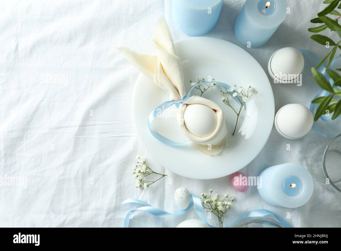 Concept of Easter table setting, space for text Stock Photo