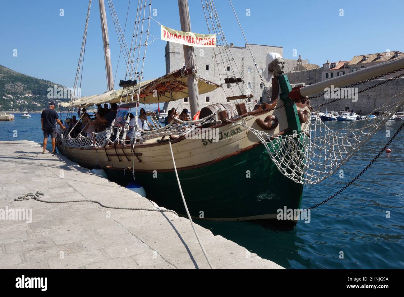 Pleasure cruise from Dubrovnik old harbour aboard a vintage wooden ship. Stock Photo