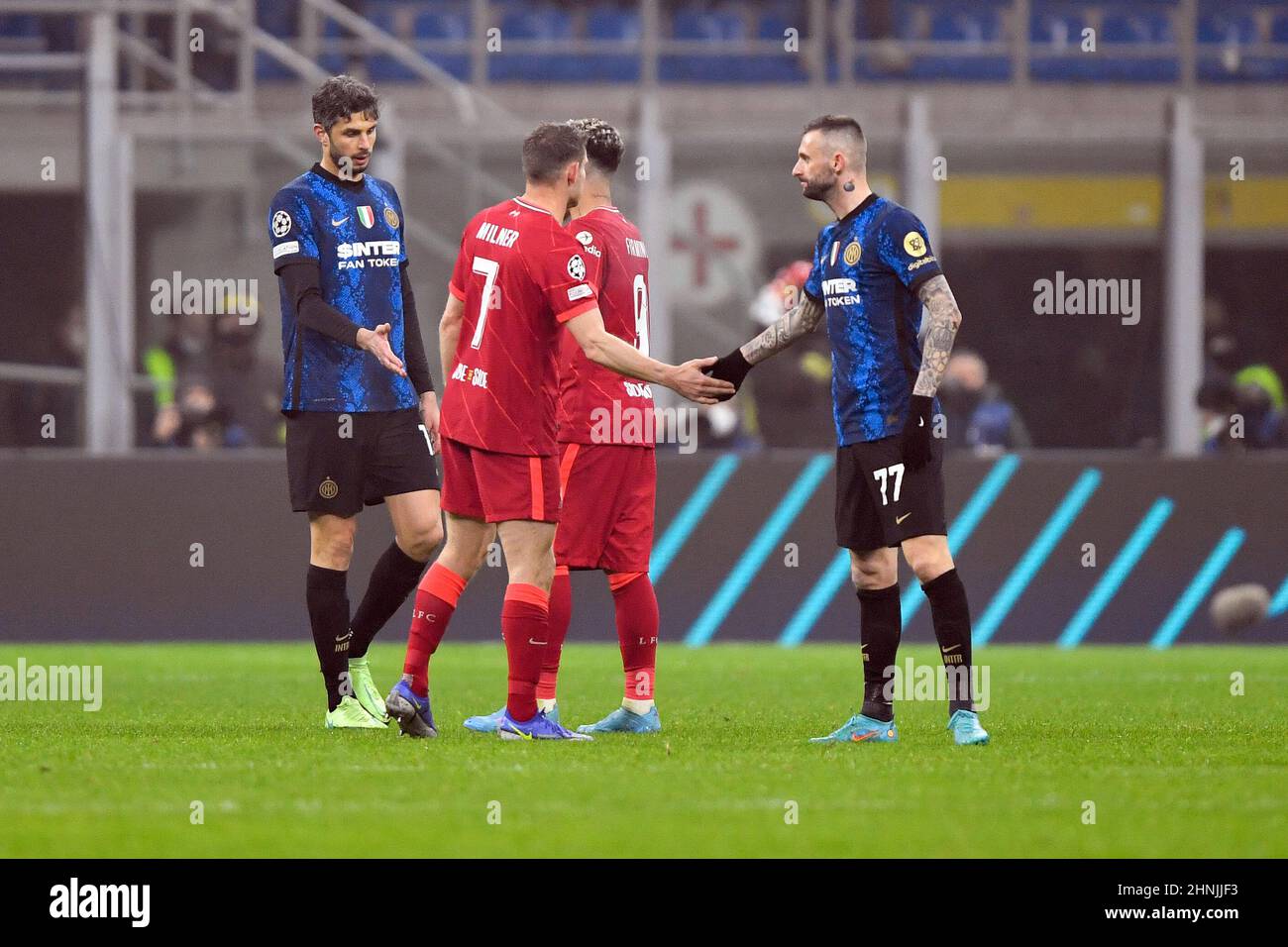 Milano, Italy. 16th Feb, 2022. Marcelo Brozovic (77) of Inter thanks James Milner (7) of Liverpool after the UEFA Champions League match between Inter and Liverpool at Giuseppe Meazza in Milano. (Photo Credit: Gonzales Photo/Alamy Live News Stock Photo