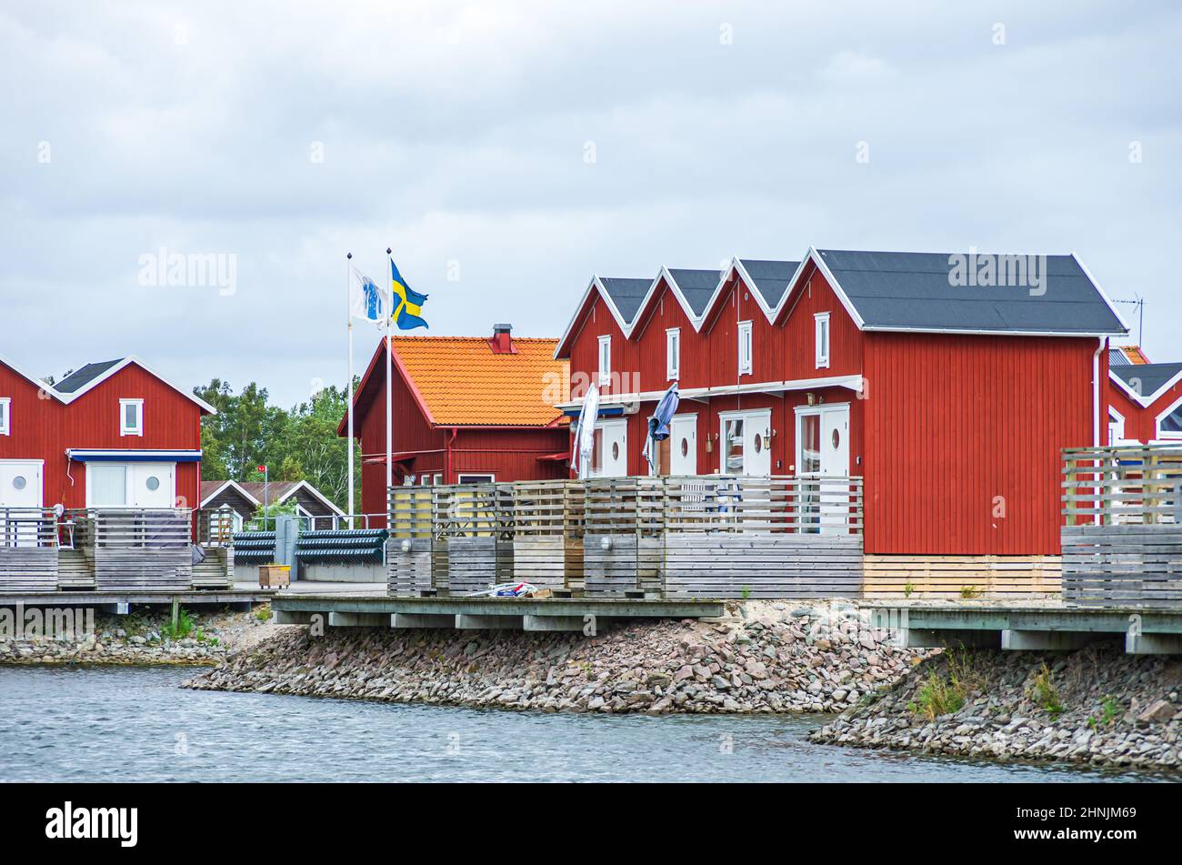 Mellerud, Dalsland, Västra Götalands län, Sweden: Sunnana hamn's picturesque holiday home complex at Lake Vänern. Mellerud, Dalsland, Sweden. Stock Photo