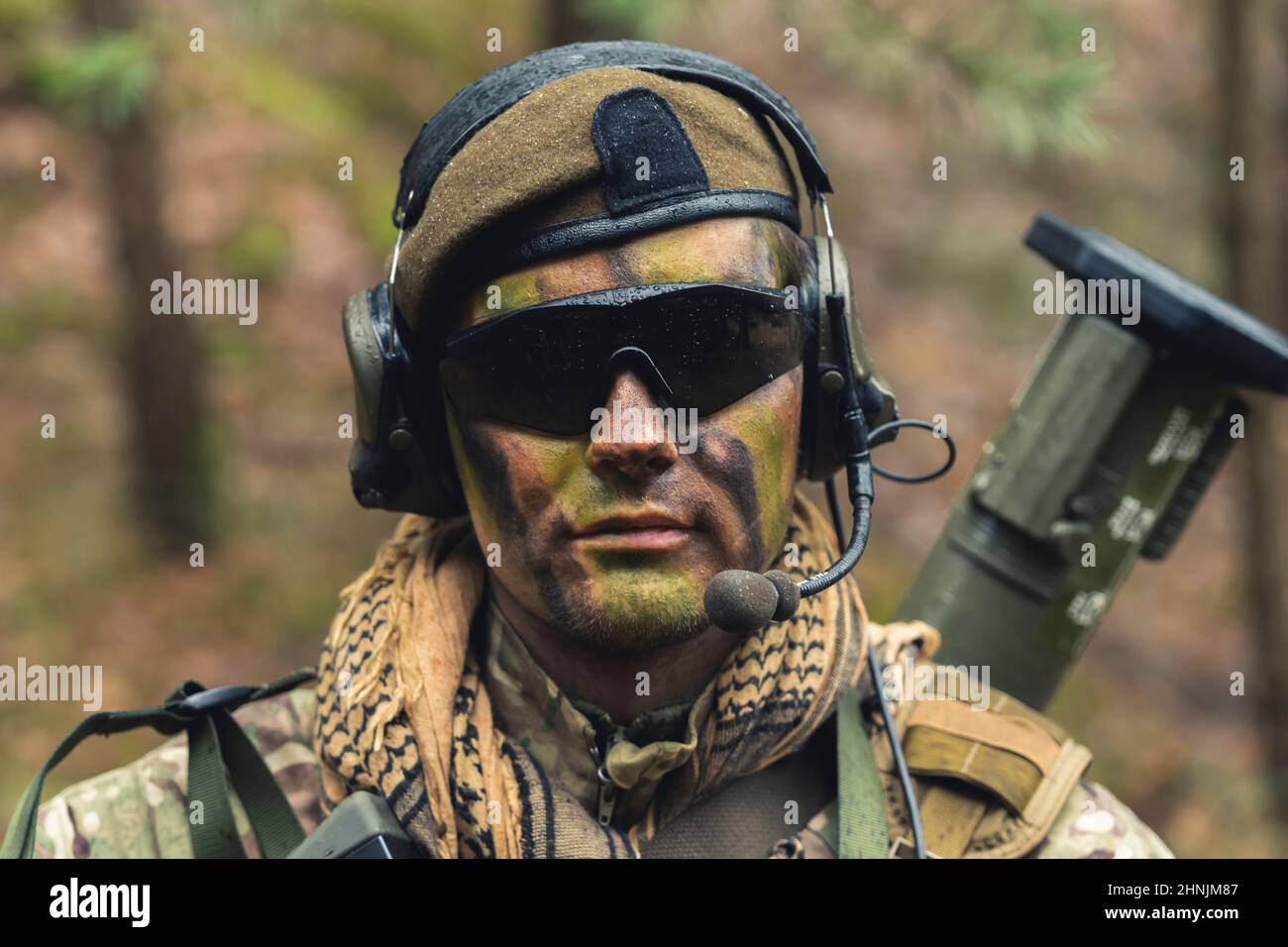 Uber cool macho tough soldier posing for a profile . High quality photo Stock Photo